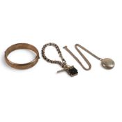 A collection of Silver jewellery including Victorian nox chain with agate revolving pendant, 1939