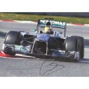 Signed photo, Lewis Hamilton, driving his 2007 McLaren Mercedes MP4-22 at Bahrain, debut season,
