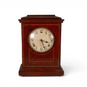 A W.M.L. Gilbert (USA) wooden cased mantle clock, height 34.5cm. needs attention