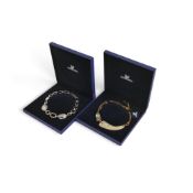 Two Swarovski Statement Necklaces to include:- Palladium-plated faceted crystal baroque hoop