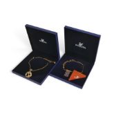 Swarovski Statement Necklaces to include:- Crystal Gold tone flower necklace with an openwork circle