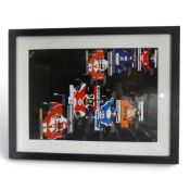 Joel Clark framed print, Speed Icons: 1976 GP Pack, depicting Niki Lauda leading James Hunt, limited