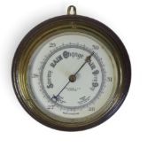 Brass Bulkhead Aneroid Barometer by John Baker & Co. Ltd mounted on wooden base. 20cm dia (not