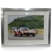 Framed artwork by Graham Bosworth depicting no.21 Ferrari 330 P4, Le Mans 1967. (H: 42cm x W: 59.
