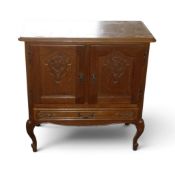 A French Louis XV-style oak cabinet featuring carved door panels & cabriole legs, H82cm x W82cm x