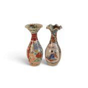 Two Japanese fluted rim vases both decorated with a floral ground and panel featuring typical