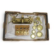Brass weights and scales, to include scales by Bush & Hall, a boxed set of weights all stamped GRM