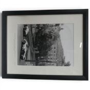 Framed black and white photograph of Stirling Moss and Juan Manuel Fangio, Mercedes-Benz, 1955