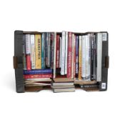An interesting collection of motorsport books featuring Stirling Moss, John Surtees, Derek Bell,