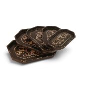 A Chinese nesting 5 tray set in black with inlaid mother of pearl type decoration, each tray with