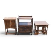 Old-charm style small oak pot cupboard with gothic style arch panelled doors, nest of tables and