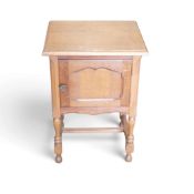 A French Louis XV-style bedside cabinet on turned legs, H65cm x W45cm x D38cm.