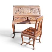 A 20th century Chinese carved hardwood drop-front secretary desk with matching chair, desk