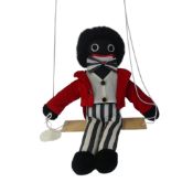 A collectable Gentleman smartly dressed in a red velvet style jacket with a white waistcoat