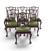 Mahogany dining chairs in the Chippendale design, two carvers and four chairs. (6)
