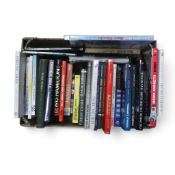 An interesting collection of motorsport books featuring Stirling Moss, Lewis Hamilton, Mario
