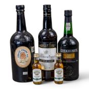 Cockburn's Special Reserve Port, sealed 75cl bottle, two miniature Bowmore single malt Scotch Whisky