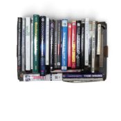 An interesting collection of motorsport books featuring Stirling Moss, Nigel Mansell, Gilles