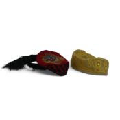Traditional handmade velvet hat, featuring ornate gold thread embroidery and decorative beadwork,