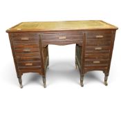 Edwardian oak seven drawer writing desk with leather writing top. Collection/courier only (H: 77cm x