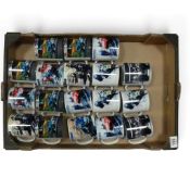A good collection of ceramic coffee mugs featuring various motorsport artwork. (1 Tray)