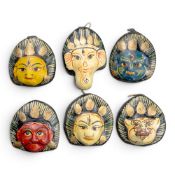 A collection of Vintage clay masks, hand-painted traditional crafts possibly from India/Nepal, 5 x