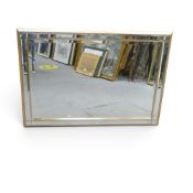 Large rectangular bevelled wall mirror, featuring a gold outer frame with an inner border of