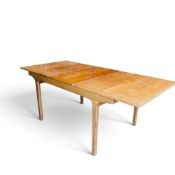 Large Nathan mid-century rectangular teak extending dining table, with fold out leaf. Collection/