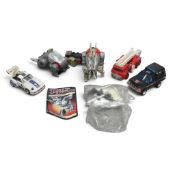 A collection of vintage Generation 1 Transformers and Dinobots. (Small Tray)