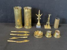 A collection of brass trench art - a pair of shell vases with Worcestershire Regiment engraving,