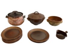 A studio pottery terracotta tureen & cover with moulded applied handles; another similar in