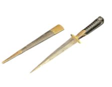 A C19th Corsican stiletto dagger, the plume carved ebony grip, brass socket and guard above a