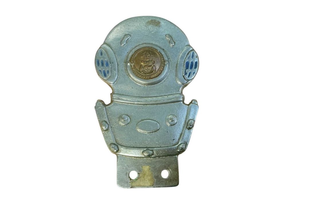 Unusual vintage car badge in the form of a diving helmet, mounted with a Royal Navy button