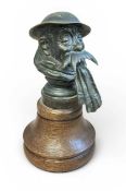 Early 20th century Bruce Bairnsfather 'Old Bill' brass car mascot, stamped signature 'Bruce Bairnsfa