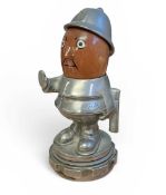 Early 20th century 'Bobby' Policeman car mascot, with moving ceramic head, signed Hassall, mounted o