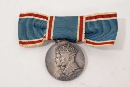 The Coronation of H.M. King George VI 1937, silver Coronation medal with bow ribbon for ladies