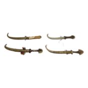 Group of four various Khanjar daggers together with a Gurkha Kukri, (5).