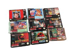 Collection of boxed Super Nintendo Games to include limited edition tin boxed Street Fighter 2, Home