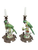 Pair of 19th century style gilt metal mounted parrot candlesticks