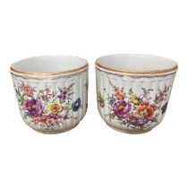Pair of antique Continental porcelain jardinières decorated with flowers