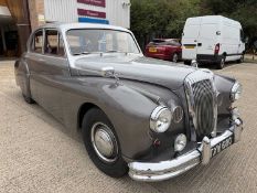 1957 Daimler One-0-Four Sportsman saloon, reg. no. TXW 680.