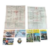 Group of assorted automobilia to include Jaguar E Type and Hillman Minx lubrication charts, AA badge