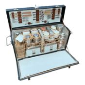 Good quality 1930's comprehensive four person picnic set in original fitted case, with makers / reta