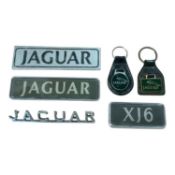 Group of Jaguar badges and keyrings, (6).