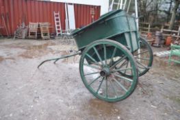 A TWO BENCH SEAT HORSE DRAWN GOVERNESS CART, with leaf spring suspension to rubberised steel on