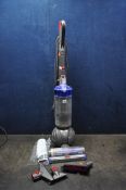 A DYSON SMALL BALL ALLERGY UPRIGHT VACUUM CLEANER with attachments etc (PAT pass and working)