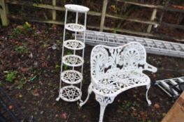 A CAST ALUMINIUM GARDEN BENCH with pierced fretwork foliate detail, 103cm wide and a tiered pan