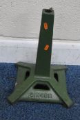A GREEN PAINTED CAST IRON SINGER MACHINIST STOOL BASE, height 39cm, condition report: top section