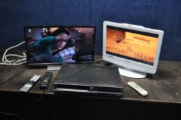 A TOSHIBA 24WL3A632DB 24in TV with remote, a Tesco 19in TV/DVD combi (both PAT pass and working) and