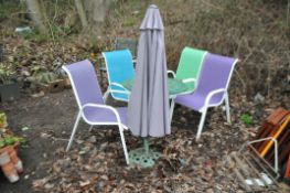 A CAST ALUMINIUM GARDEN TABLE 80cm in diameter with four metal framed chairs with fabric seats, a